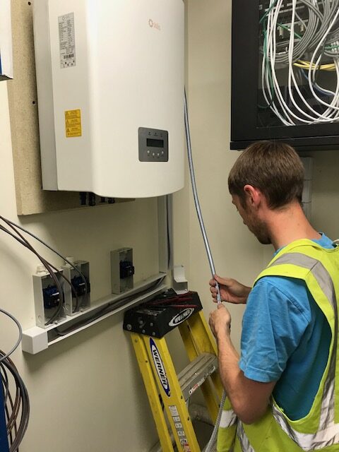 Coombe School - Connections being made in the plant room at ground level of this commercial install